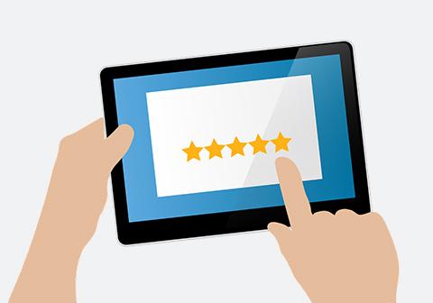 Bild von einem Tablet, das gerade für eine Online-Umfrage bedient wird.